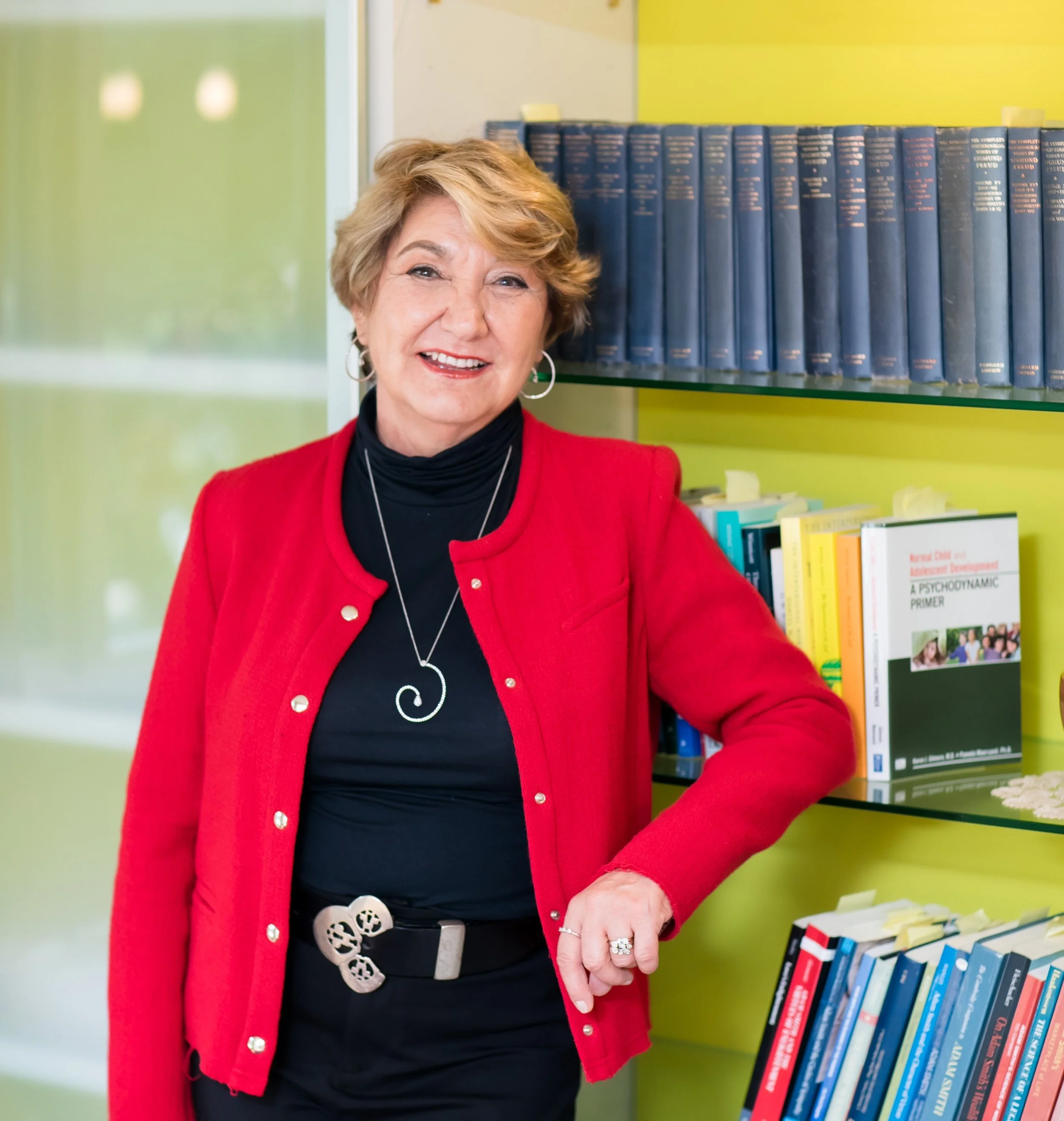 Dr. Şule Özler, a licensed clinical psychologist, in a calm, warmly lit portrait.